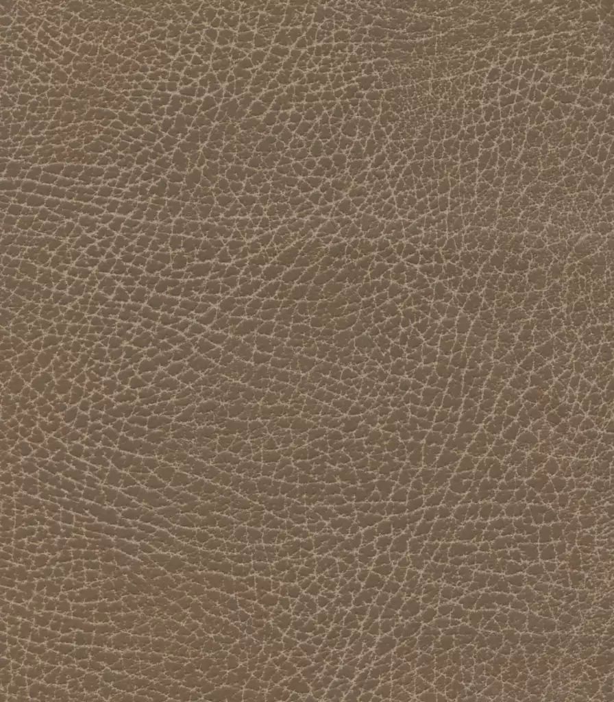 The brown leather texture, with its fine cracks and creases, mirrors the rugged elegance and sophistication of the Golden Tech PR766 Relaxer MaxiComfort Recliner With Lift Assist - Small, highlighting leather grain variations akin to MaxiComfort Positioning technology.